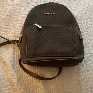Michael Kors bag/ brown and acorn color large in size and great condition